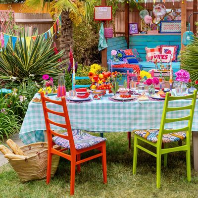 This outdoor space has been transformed into a vibrant French garden bistro complete with a veggie centrepiece!