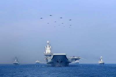 China’s navy conducts combat patrols near disputed South China Sea shoal