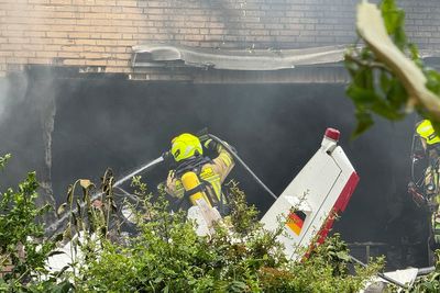 Two killed after small plane crashes into German house