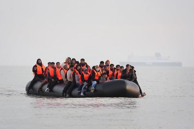 Record 1,194 migrants cross Channel in a day as UK urges France to act