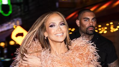 Jennifer Lopez's travel outfit is a masterclass in laidback glamour, proving wide-leg jeans and a white shirt will always work