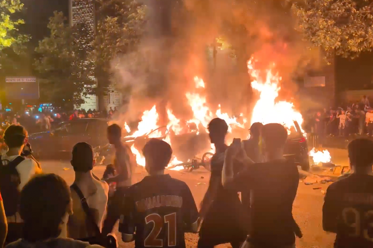 Watch: Fans clash with riot police in Paris after…