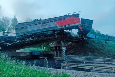 Explosions caused 2 bridges in western Russia to collapse, officials say. Seven people were killed