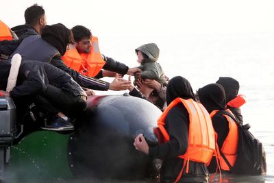Smuggler boats pick up Channel migrants ‘like taxi service’ while French police stand by, minister fumes