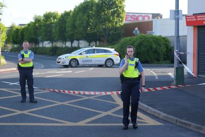 Man dead and child injured after shots fired at shopping centre in Ireland