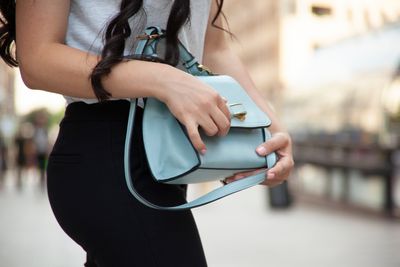 10 Things You Should NEVER Let a Stranger Hold for You