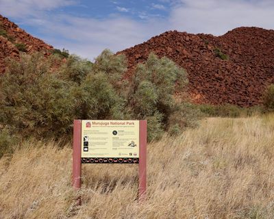 Australia to lobby Unesco over barring of ancient rock site from world heritage list due to Woodside emissions