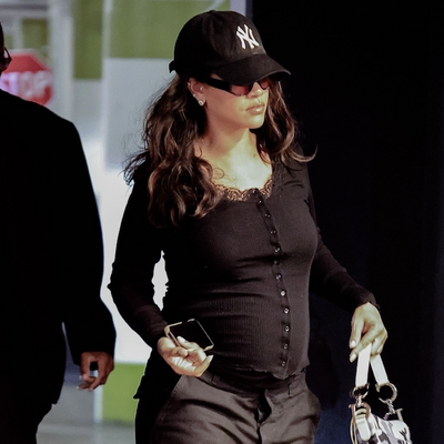 Rihanna Rebrands the Early-2000s Henley With Cargo Pants and a Camo Dior Saddle Bag