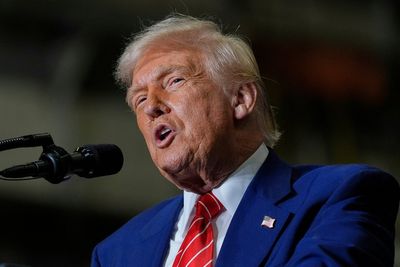 Trump attacks ‘third rate’ biographer over claim president targeting Harvard because he didn’t get in