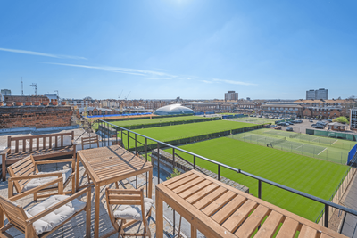 From Queen's Club court views to Fred Perry's former home, here are smashing homes for tennis fans