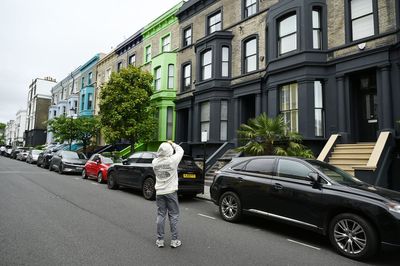 Notting Hill residents paint famous colourful houses black in bid to put off influencers and stop 'disruptive overtourism'