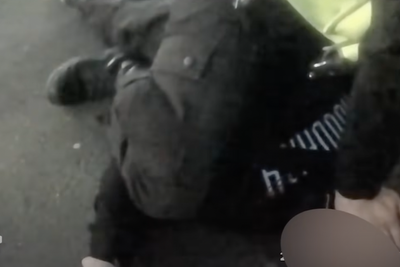 Police officer pins boy to floor and screams in his face in shocking body worn camera footage