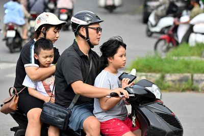 Vietnam approves law to end two-child policy as it tries to reverse plummeting birth rate