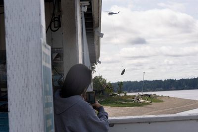Flying boats make for a rare sight as Washington clears an island of derelict vessels by helicopter