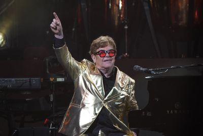 Elton John says ‘we will not back down’ in awards speech addressing AI concerns