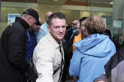 Tommy Robinson denies harassing two journalists