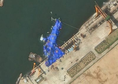 North Korea raises capsized warship after botched launch: Report