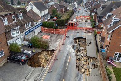 New clues over massive Surrey sinkhole after network of tunnels discovered near street