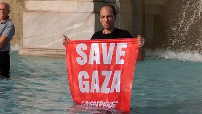 Rome’s iconic Fontanone dyed red to oppose Italy’s military deals with Israel