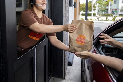 He graduated high school, then helped out coworkers while still wearing his sash. Now strangers have given him over $200,000 for college