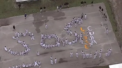 WATCH: Cuban Detainees at Florida's Krome Detention Center Protest Deportations Forming Human SOS Sign