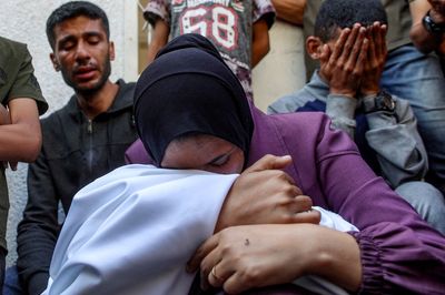 Israeli attacks in Gaza kill more than 70, including several near aid site