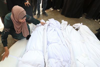 Israel kills more than 70 in Gaza, including 16 in attack on family home