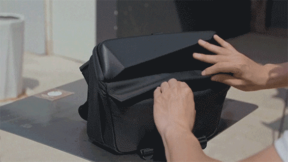 This is the world's first magnetic, zipper-free camera sling for one-handed gear access