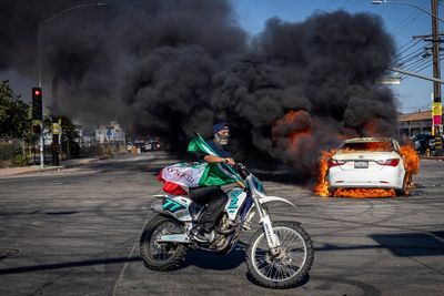 Fires erupt in streets as anti-ICE protests continue for second day in LA