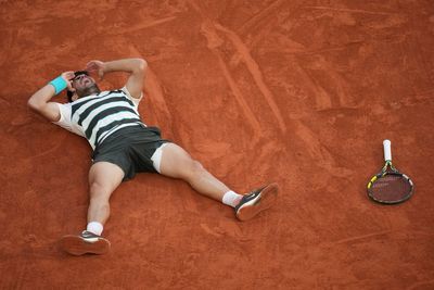 Carlos Alcaraz defends French Open title after epic tussle with Jannik Sinner