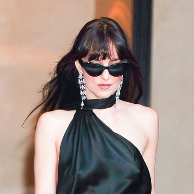 Dakota Johnson's Backless Gucci Gown, Horsebit Bag, and Diamond Earrings All Scream Romance