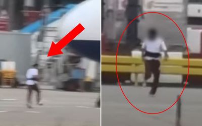 Man chased across Heathrow tarmac was 'being deported on commercial flight'