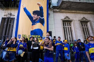 AP PHOTOS: Boca Juniors and River Plate fans taking their passion to the FIFA Club World Cup