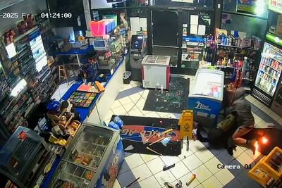 Bizarre moment burglar breaks into Oregon gas station, sets himself on fire, fights K9 then gives up