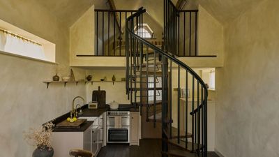 An underutilized tiny home has been turned into a cozy and surprisingly spacious retreat – it's all thanks to a thoughtful layout and an organic modern scheme