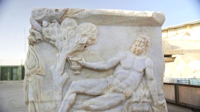 'Extraordinary' sarcophagus discovered in Israel shows carving of Dionysus beating Hercules in a drinking contest