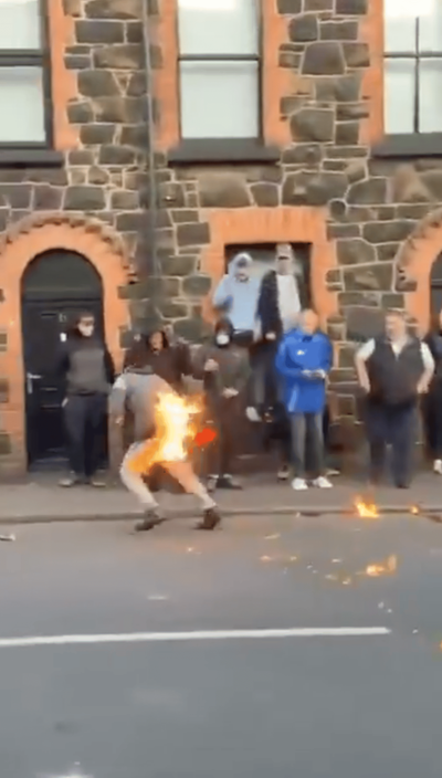 Watch: Moment Ballymena rioter sets himself on fire as violence erupts for second night