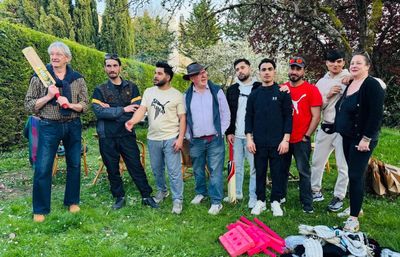 Chipboard and carpet: refugee cricket tournament brings a moment of happiness