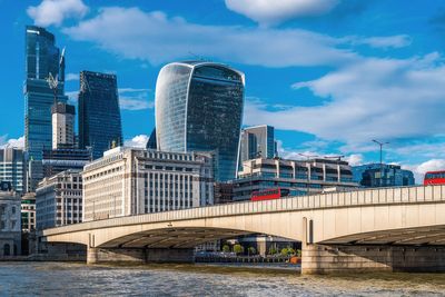 Woman rushed to hospital after crash between bus and bike on London Bridge
