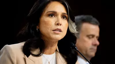 Tulsi Gabbard claims ‘elites’ are planning the end of the world, forgets her boss is one of them