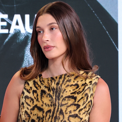Hailey Bieber Models a Vintage Versace Leopard-Print Mini Dress That's Exactly Her Age—and a Piece of Fashion History