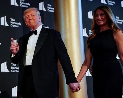 Boos, cheers and a heavy dose of irony as Trump takes in Les Mis against backdrop of LA protests