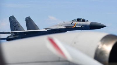Chinese fighter jet in near miss with Japan military plane as Pacific tensions rise