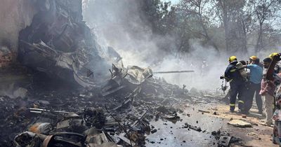 Air India flight bound for London crashes with 244 passengers on board