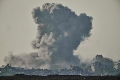 Hamas says it killed 12 Israeli-backed fighters. Israeli-supported group says they were aid workers