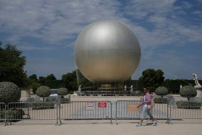 The Paris Games flame rises again — but it’s no longer ‘Olympic’