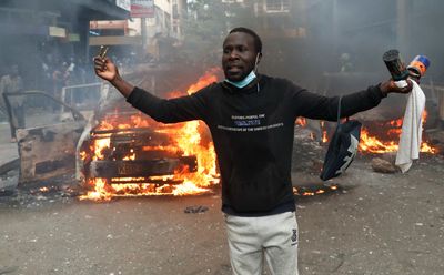 Police fire tear gas on crowds protesting Kenya blogger’s death in custody
