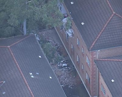 Explosion in Sydney apartment blows out brick wall and damages adjoining units