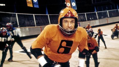 “You know what those executives dream about out there behind their desks? They dream they're great Rollerballers. They dream they're Jonathan; they have muscles, they bash in faces.” This brutal sci-fi sports movie still hits hard on its 50th anniversary