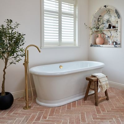 Midimalist bathrooms are the pro-clutter trend you need to know about – it's perfect for a family washroom